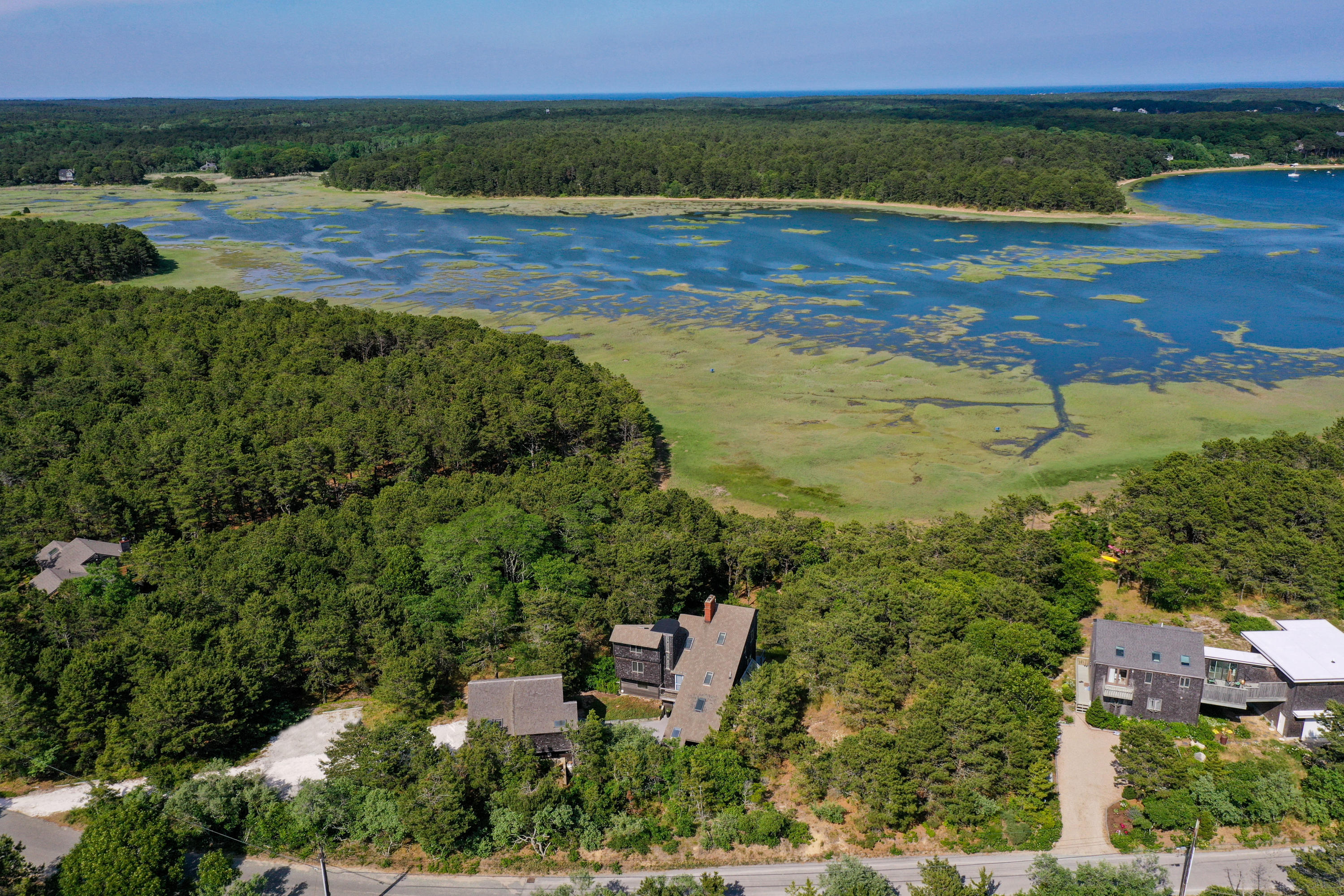 265 King Phillip Road Wellfleet, MA 02667 - Photo 75 of 85 an aerial view of residential houses with outdoor space and trees