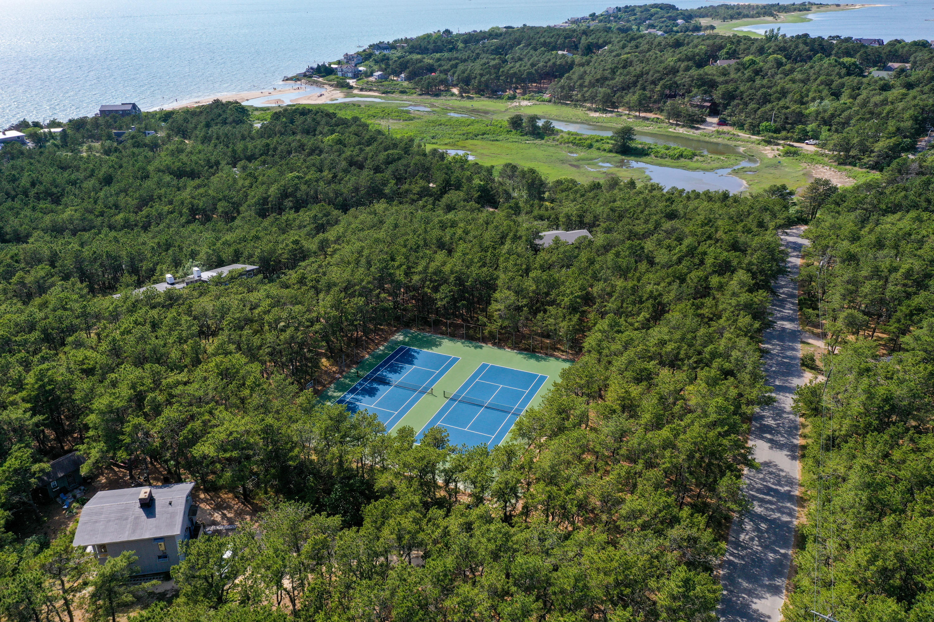 265 King Phillip Road Wellfleet, MA 02667 - Photo 78 of 85 an aerial view of a house with a yard
