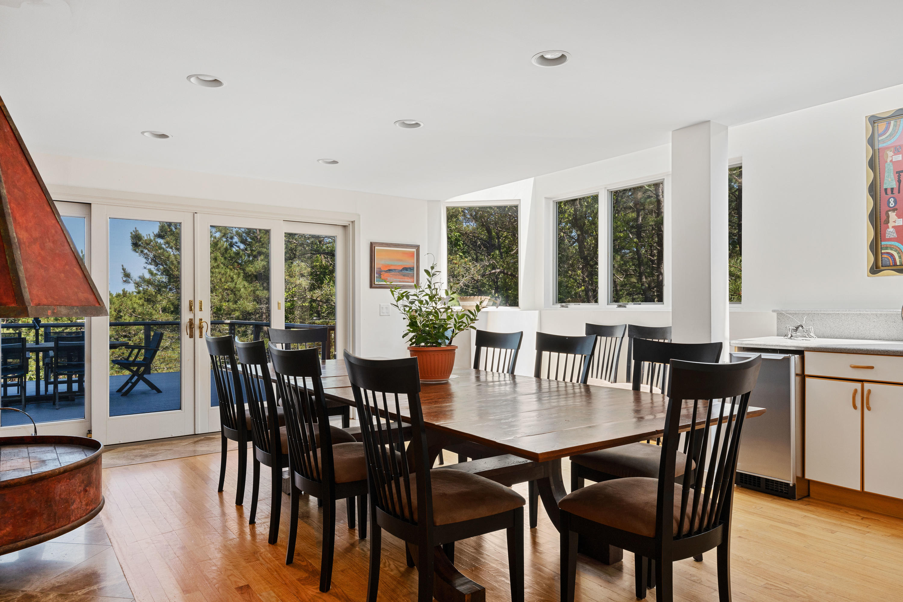 265 King Phillip Road Wellfleet, MA 02667 - Photo 9 of 85 a view of a dining room with furniture window and wooden floor