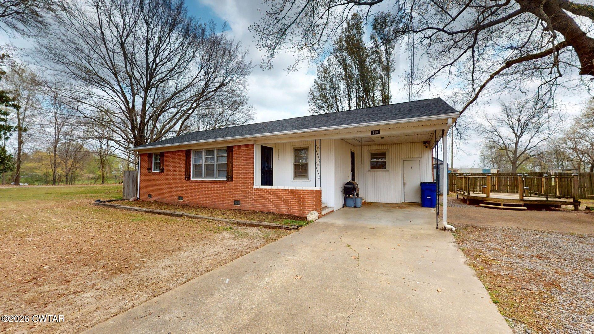 328 Terrell Road Martin, TN 38237 - Photo 18 of 18 a view of a house with a patio