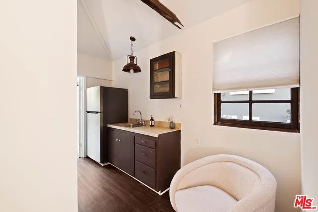 a living room with a couch and a flat screen tv