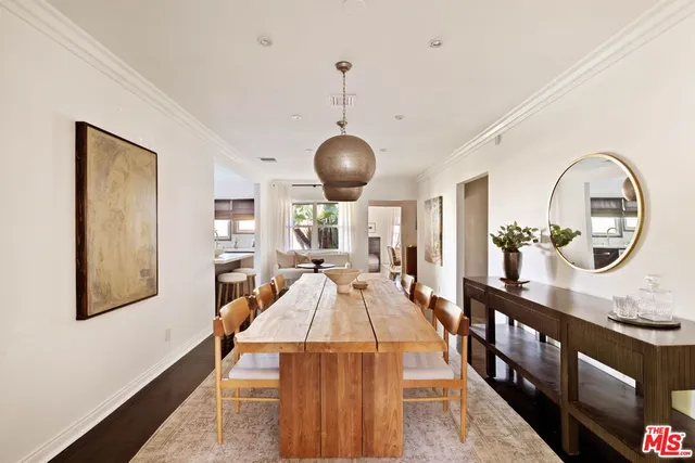 a view of a living room and dining room