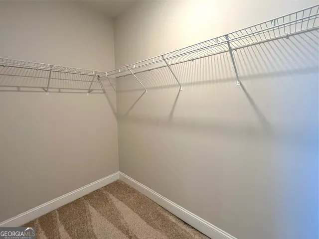 a view of a room with racks on the wall