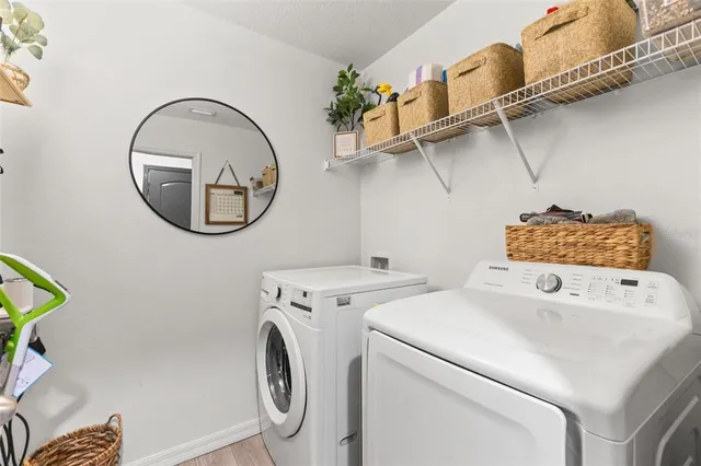 a utility room with dryer and washer