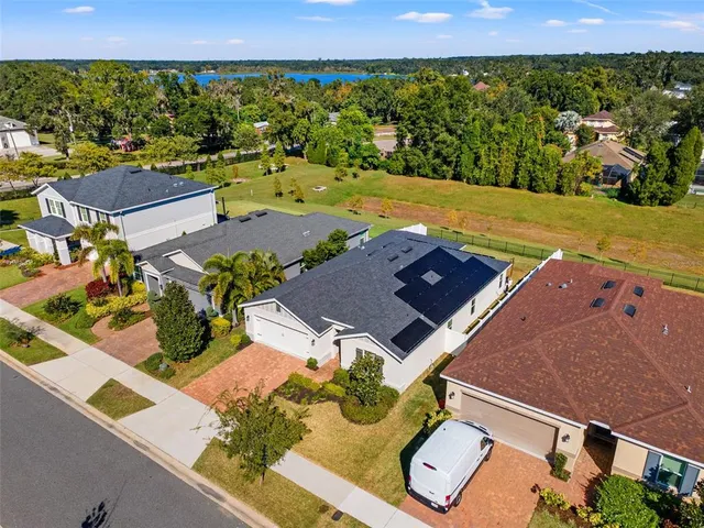 an aerial view of a house with garden space and outdoor space