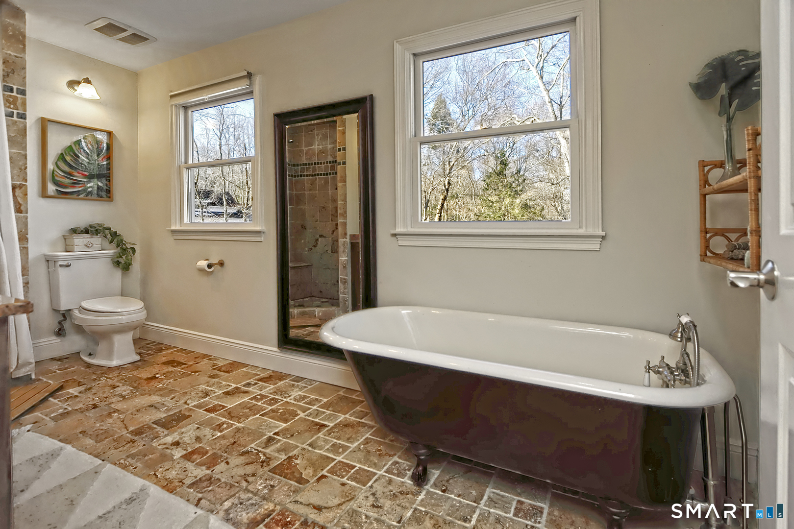 215 Wheeler Road Monroe, CT 06468 - Photo 14 of 22 a bathroom with a bathtub and a toilet