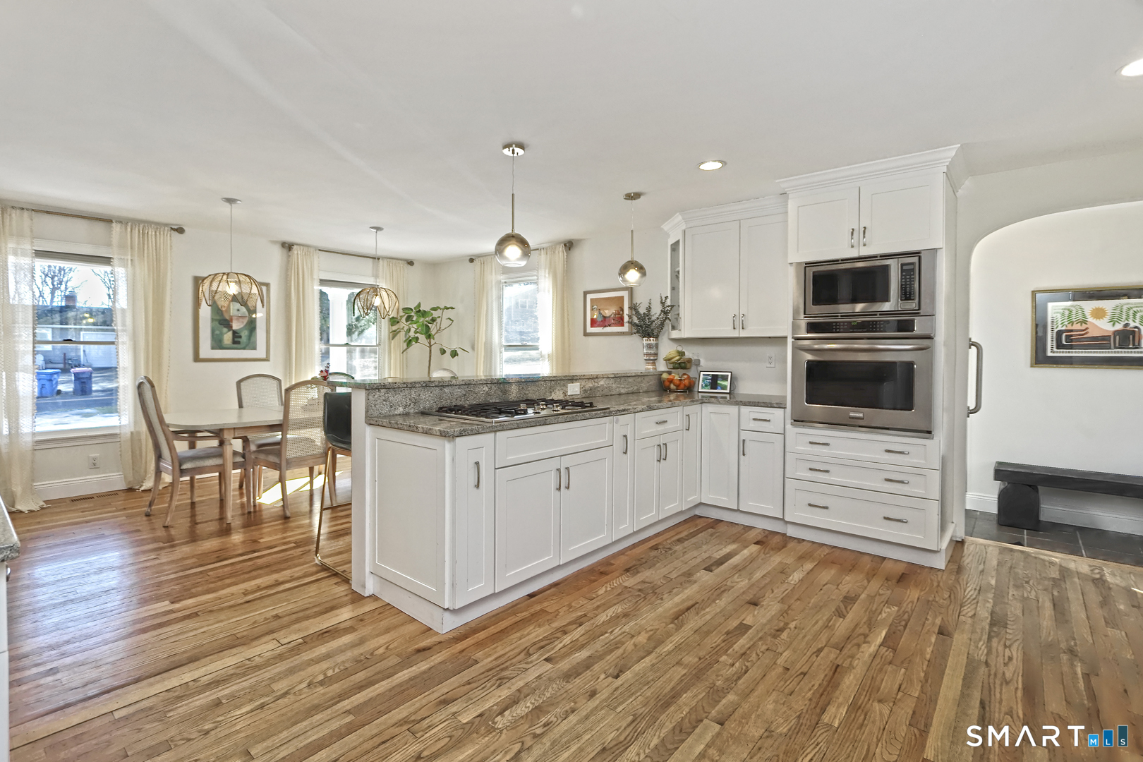 215 Wheeler Road Monroe, CT 06468 - Photo 3 of 22 a kitchen with stainless steel appliances a stove a sink and a refrigerator