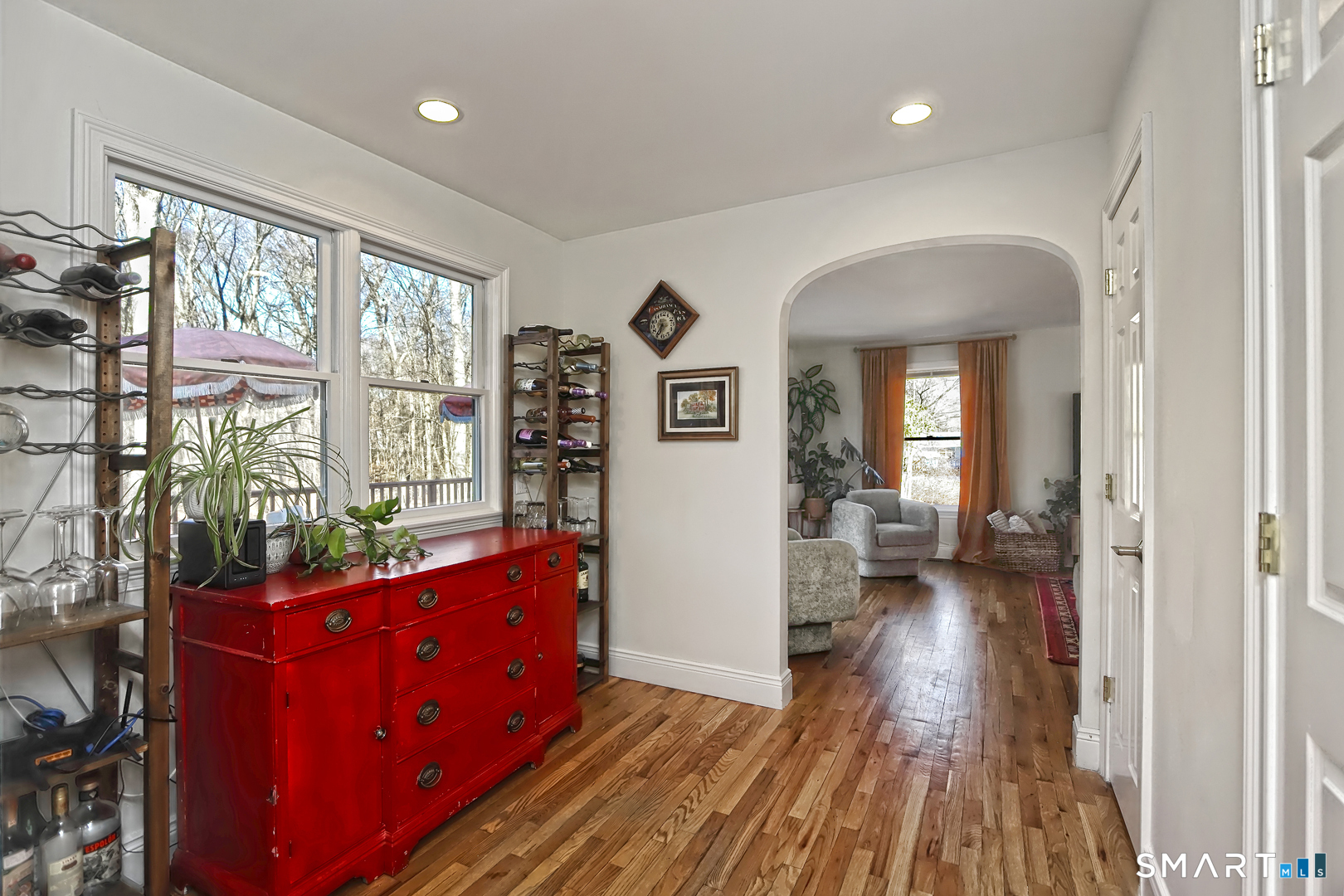 215 Wheeler Road Monroe, CT 06468 - Photo 8 of 22 a view of a room with wooden floor and furniture
