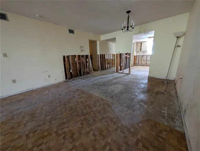 a view of a storage & utility room with lots of racks