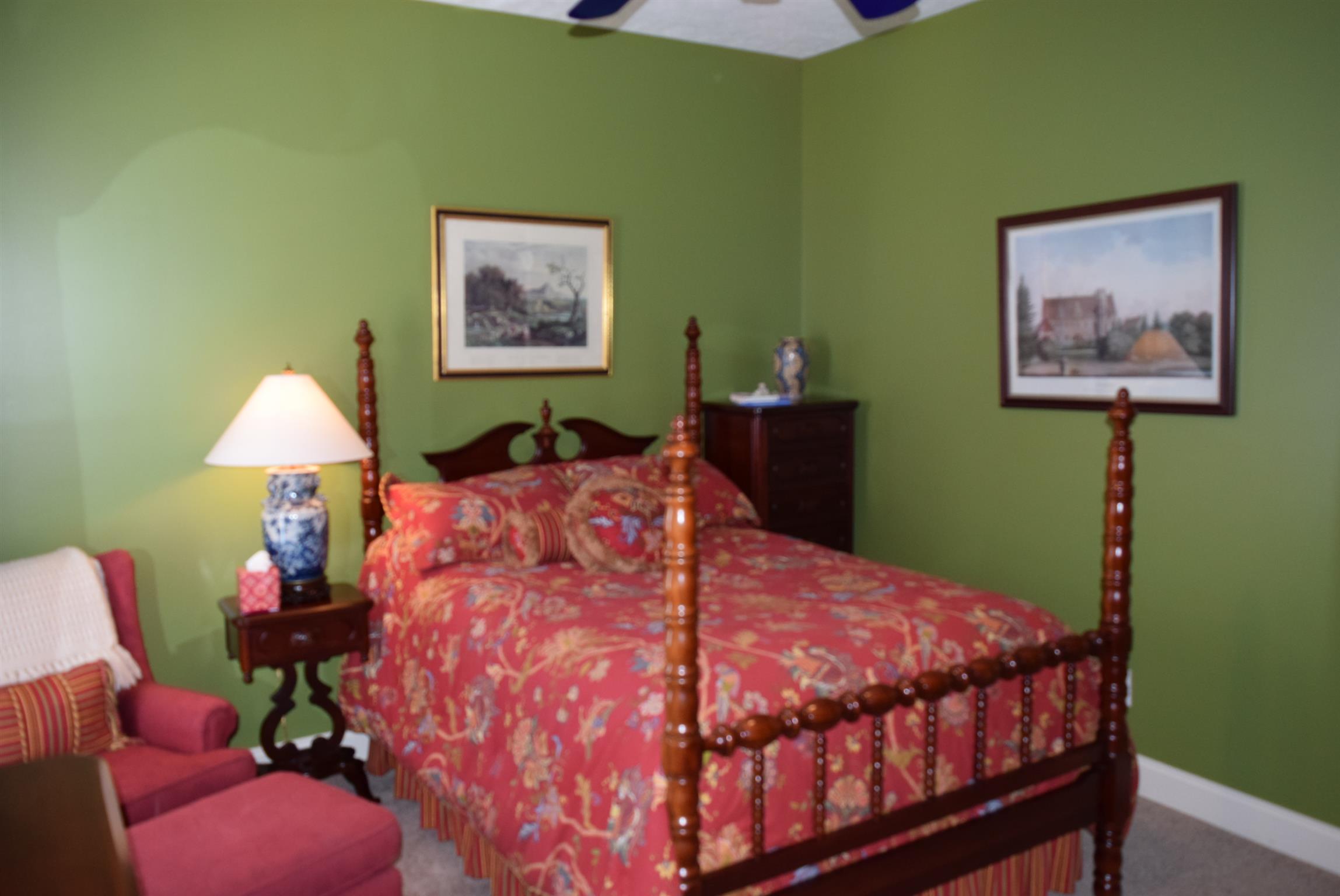8936 Fredonia Road Manchester, TN 37355 - Photo 11 of 25 a bedroom with a bed and a painting on the wall