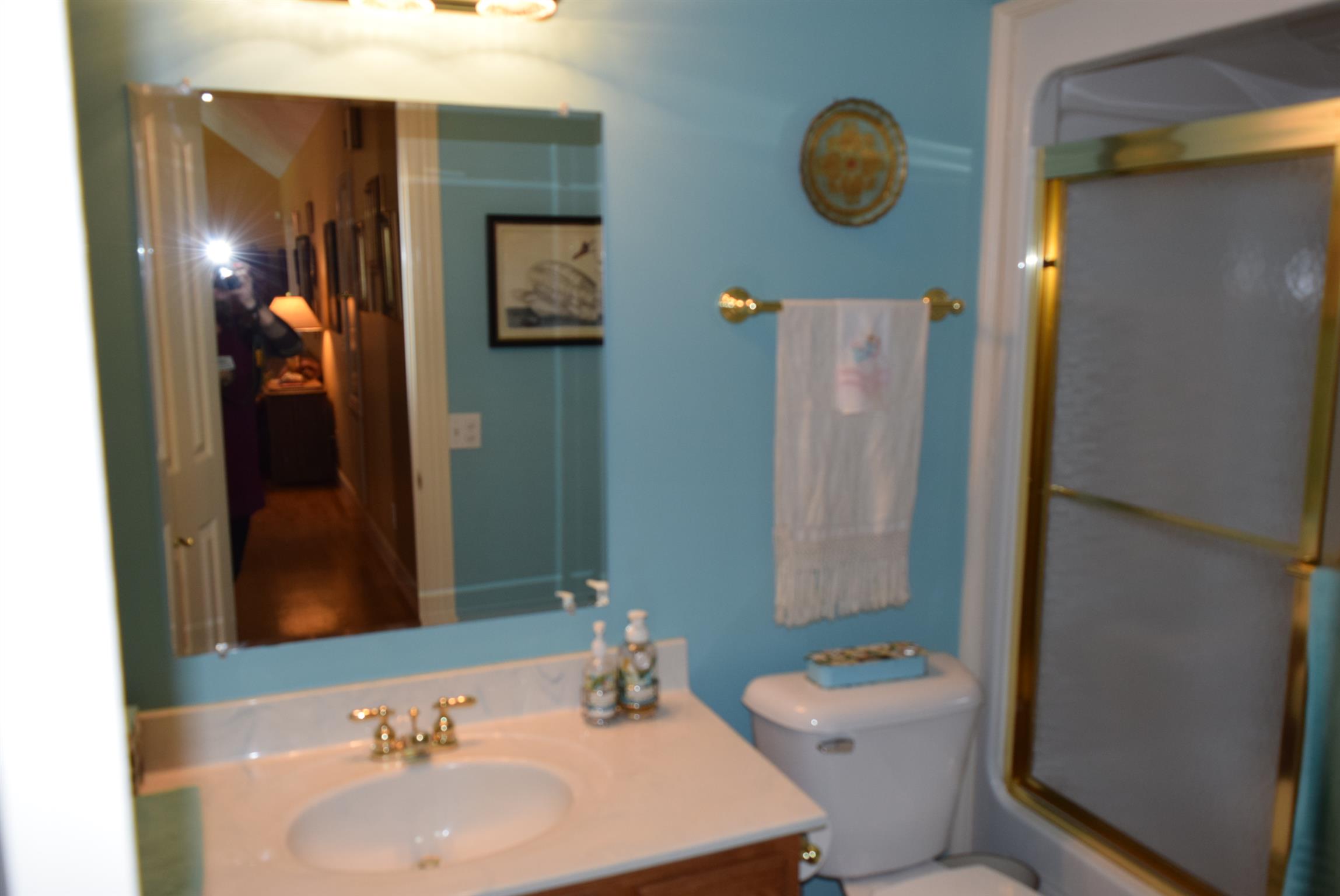 8936 Fredonia Road Manchester, TN 37355 - Photo 15 of 25 a bathroom with a sink and a mirror