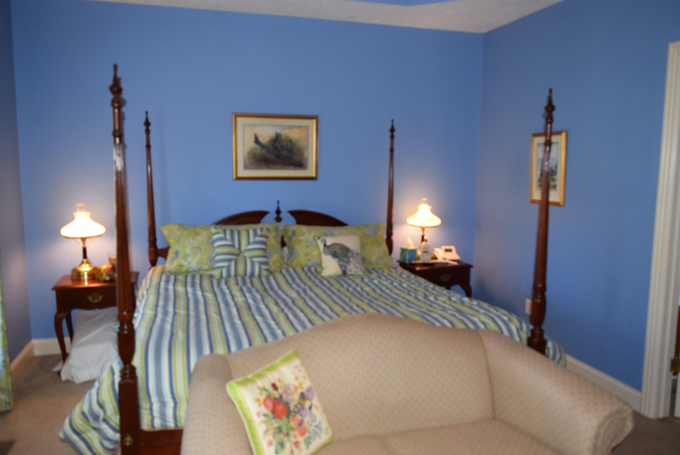 8936 Fredonia Road Manchester, TN 37355 - Photo 16 of 25 a bedroom with a bed and a lamp on table