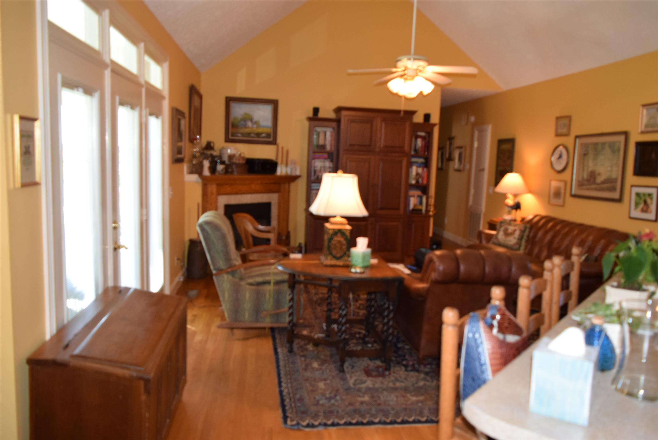 8936 Fredonia Road Manchester, TN 37355 - Photo 4 of 25 a living room with furniture a dining table and a piano table