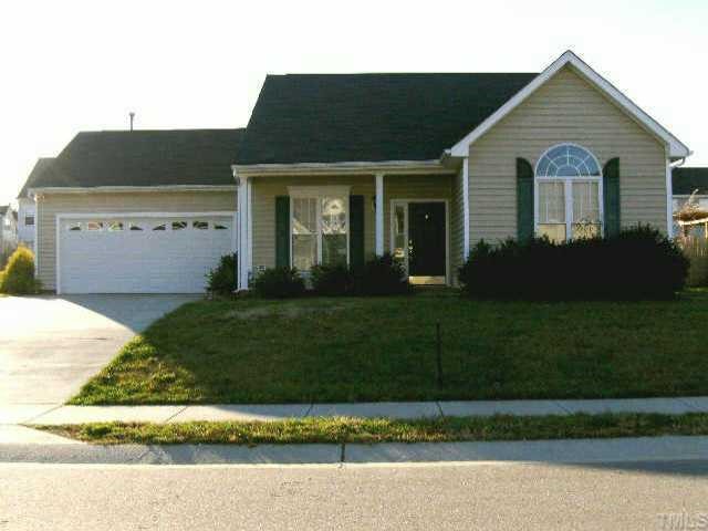 8617 Neuse Hunter Drive Raleigh, NC 27616 - Photo 1 of 1 a front view of a house with a yard