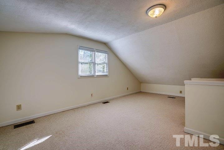 3913 Olde Coach Road Durham, NC 27707 - Photo 11 of 17 an empty room with windows