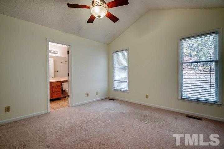 3913 Olde Coach Road Durham, NC 27707 - Photo 13 of 17 a view of an empty room with a window