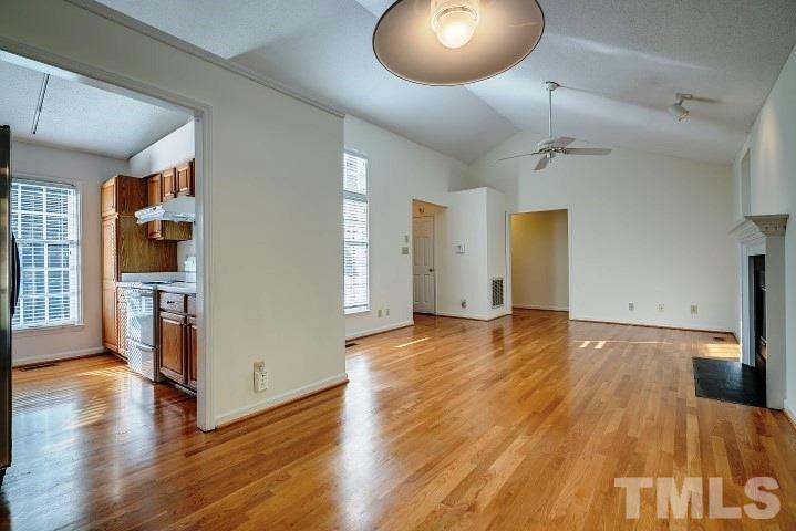 3913 Olde Coach Road Durham, NC 27707 - Photo 5 of 17 a view of empty room with wooden floor