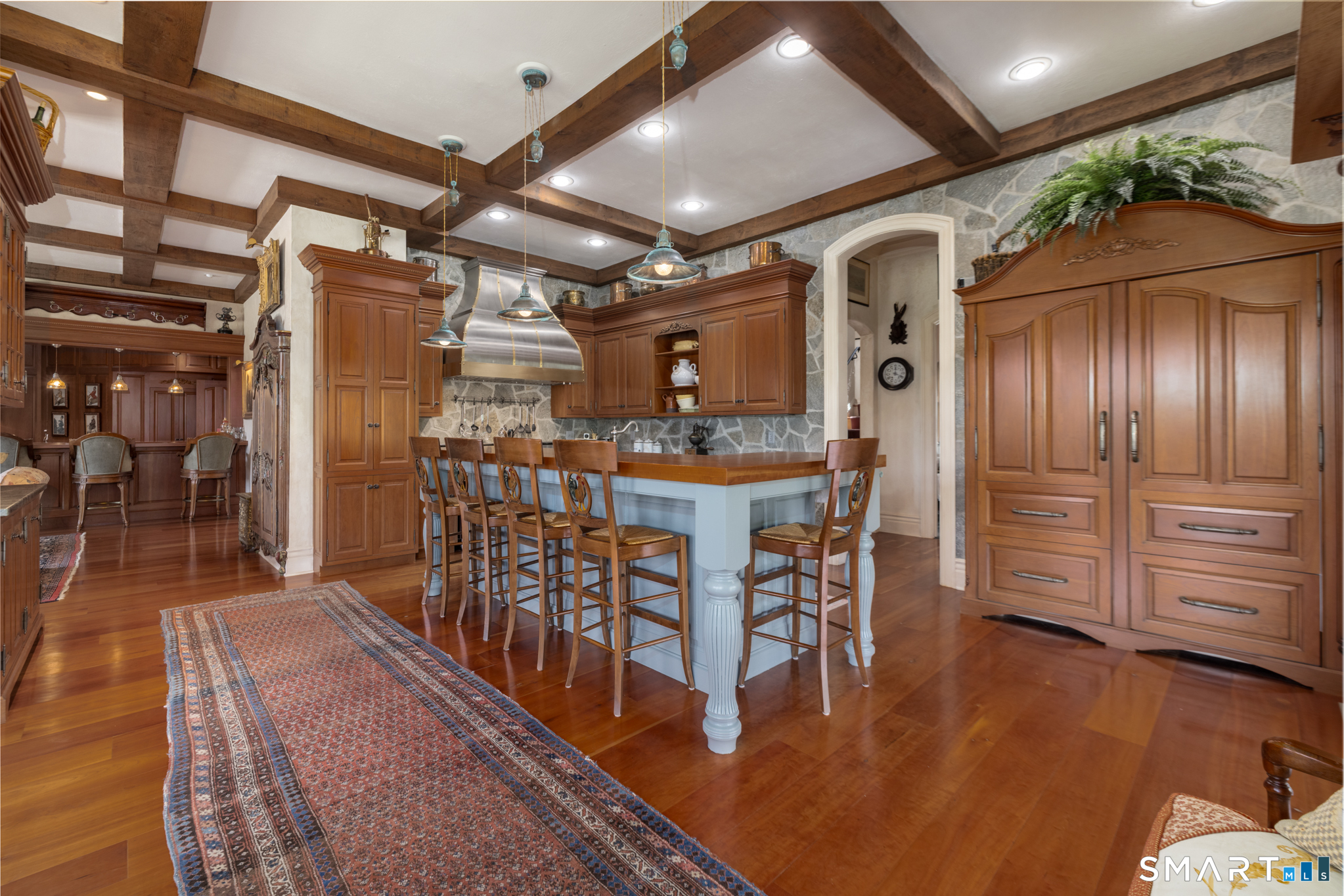 7 Equestrian Ridge Newtown, CT 06470 - Photo 17 of 40 a dining room with furniture and wooden floor