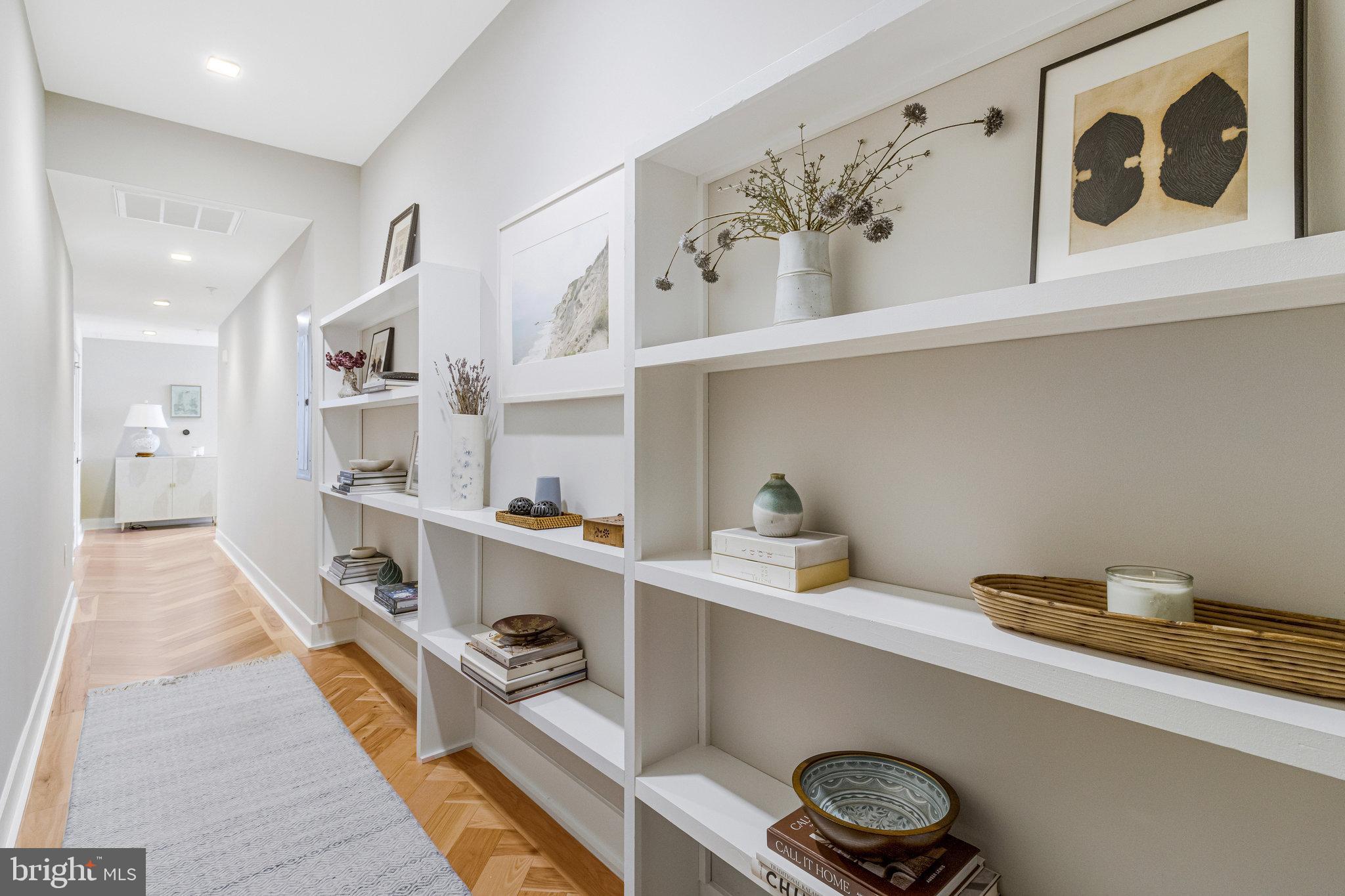 1345 K Street Southeast, Unit 406 Washington, DC 20003 - Photo 13 of 46 a hallway with cabinets