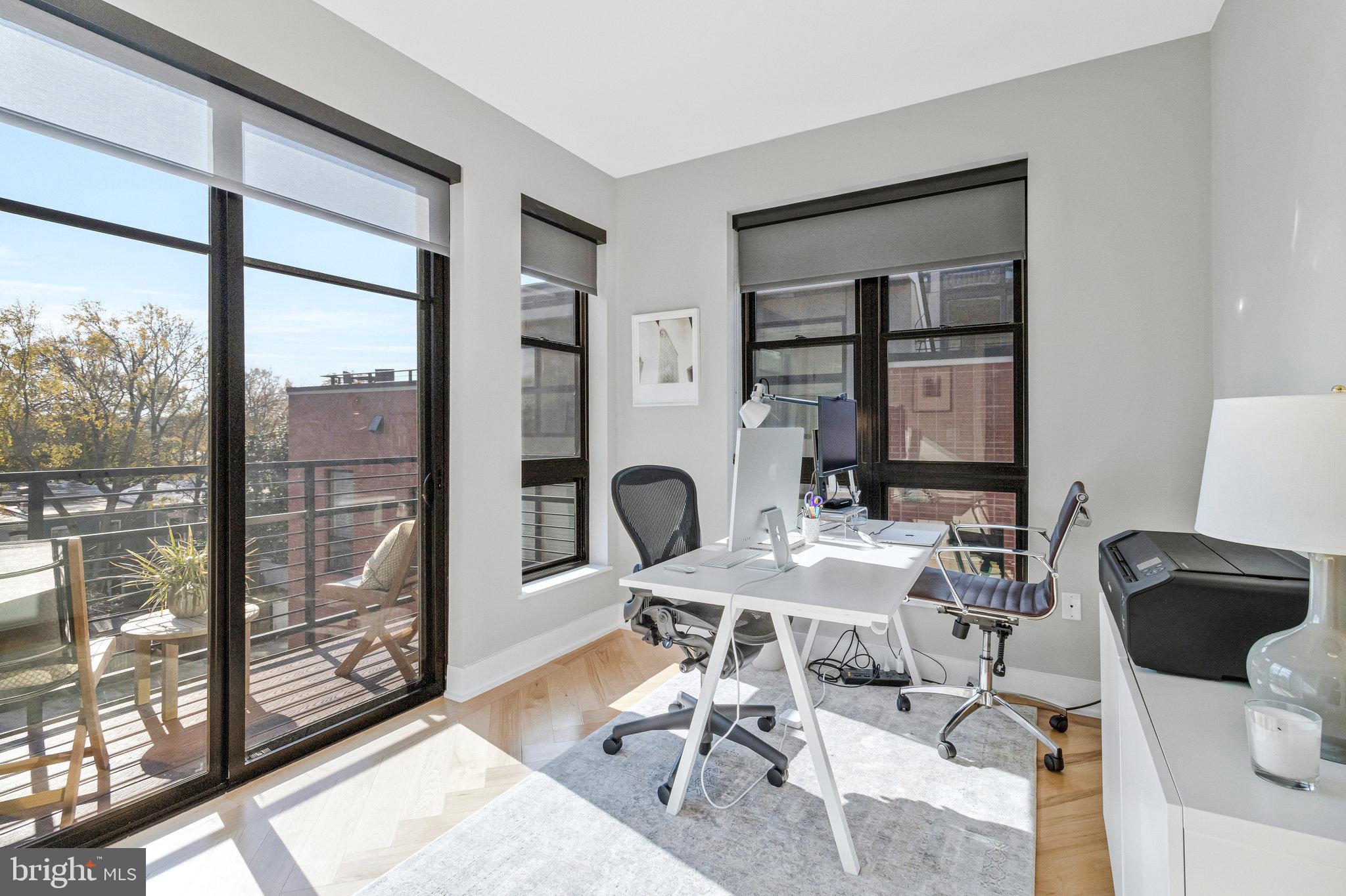 1345 K Street Southeast, Unit 406 Washington, DC 20003 - Photo 18 of 46 a workspace with furniture and a window
