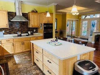 552 Bean Creek Road, Unit 94 Scotts Valley, CA 95066 - Photo 5 of 18 a kitchen with a sink a stove and chairs