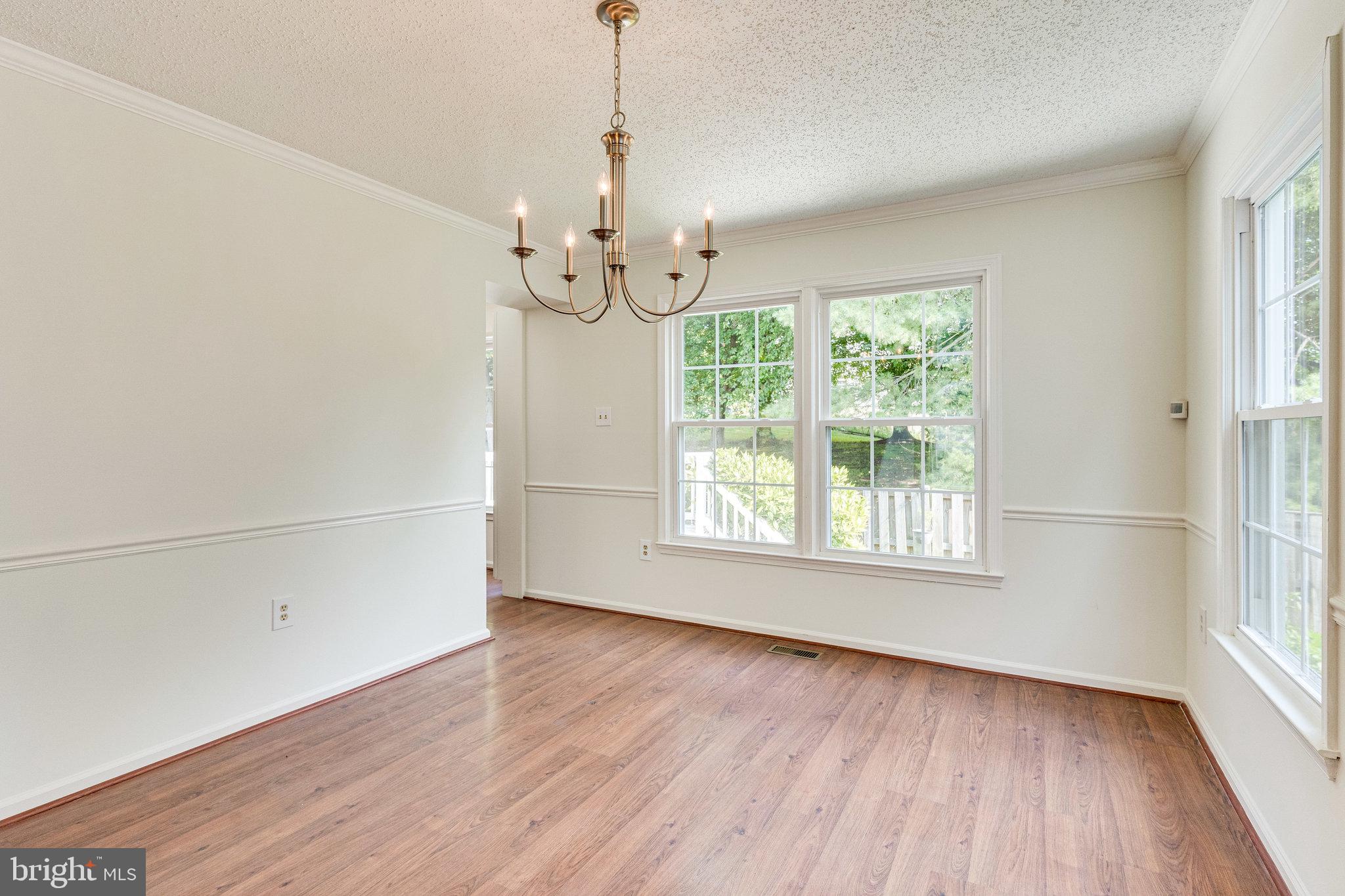 2403 Pondside Terrace Silver Spring, MD 20906 - Photo 12 of 45 Large dining room with windows on two sides