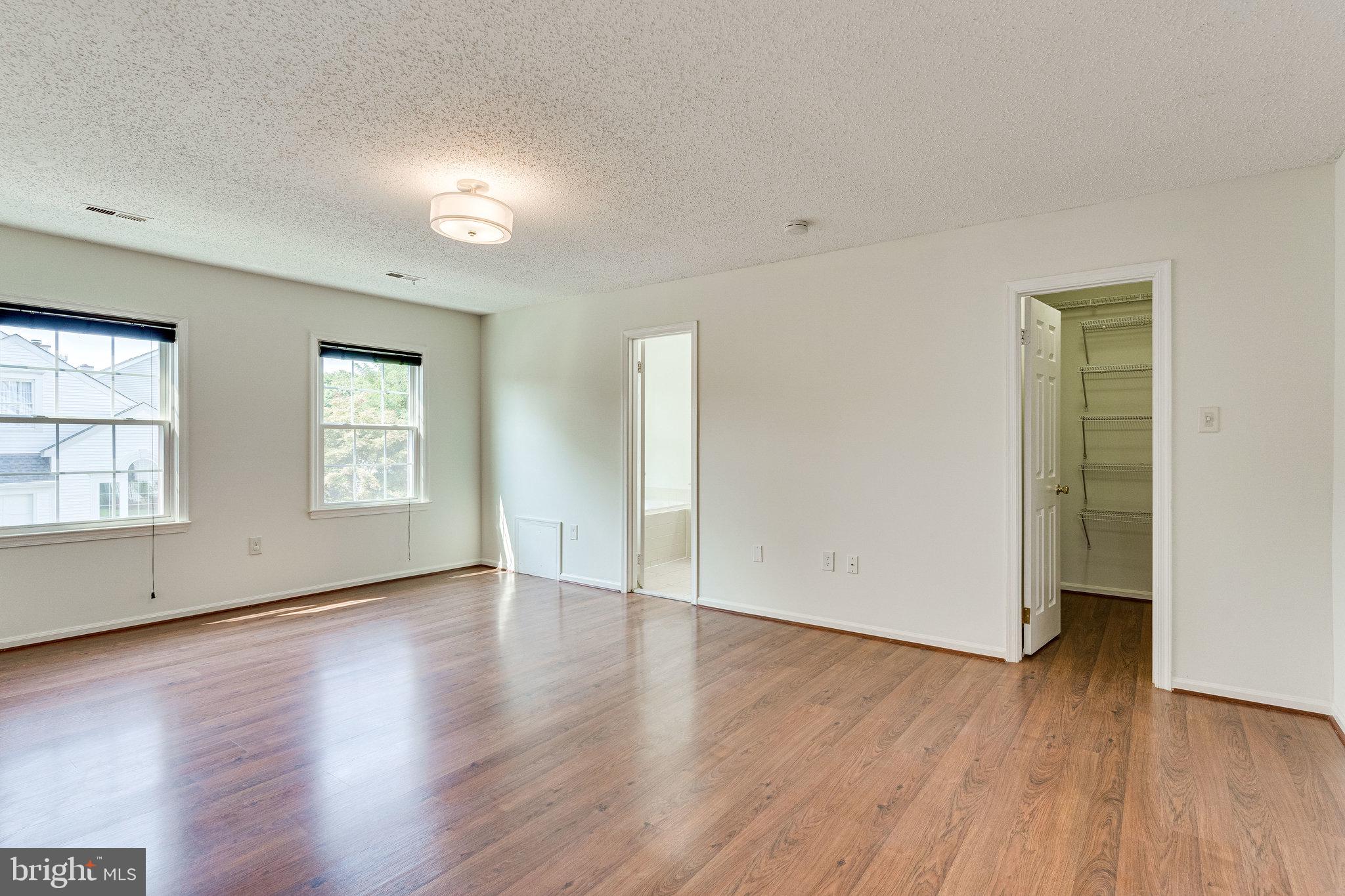 2403 Pondside Terrace Silver Spring, MD 20906 - Photo 24 of 45 Large primary bedroom with walk-in closet