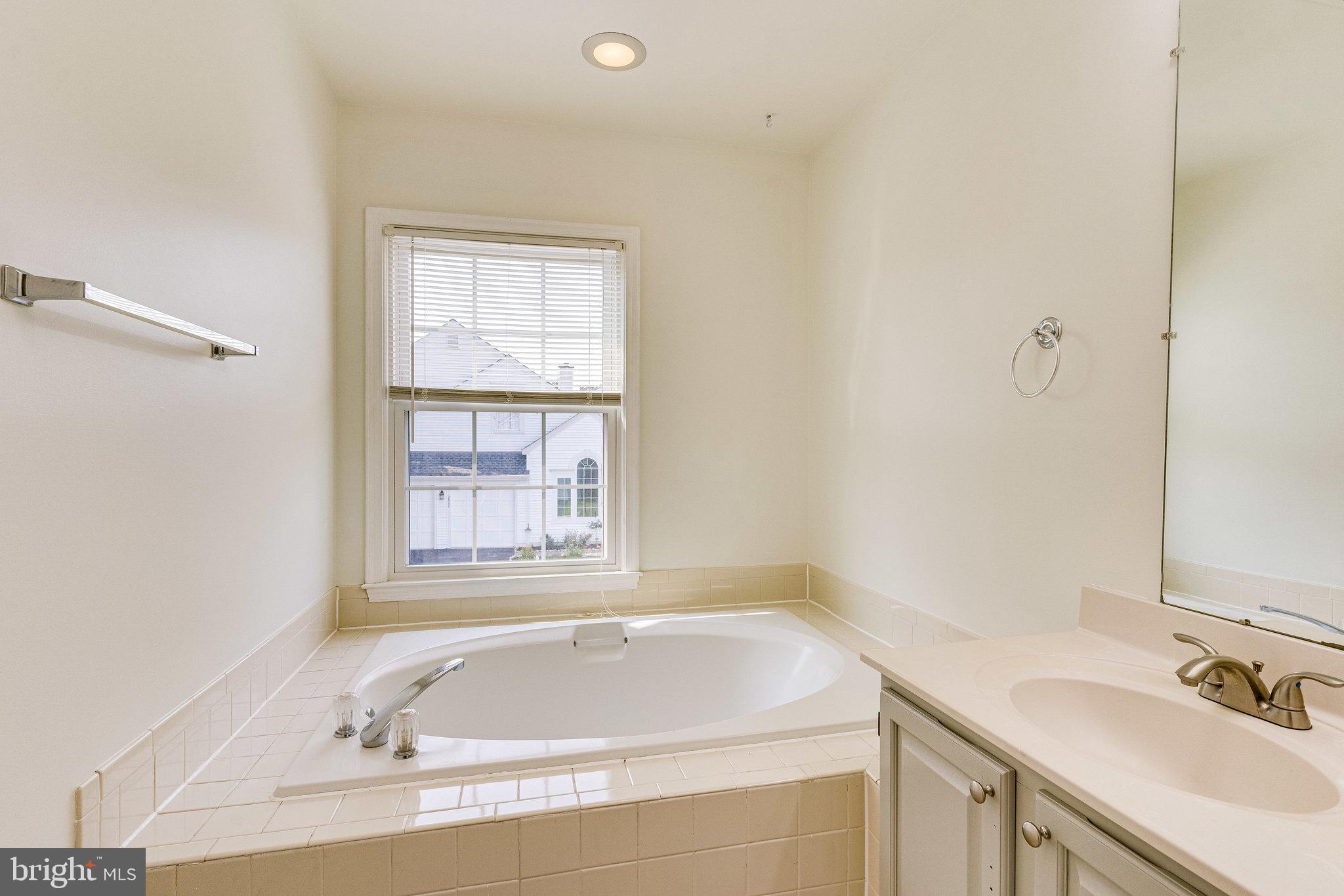 2403 Pondside Terrace Silver Spring, MD 20906 - Photo 26 of 45 Primary bath with separate tub and shower