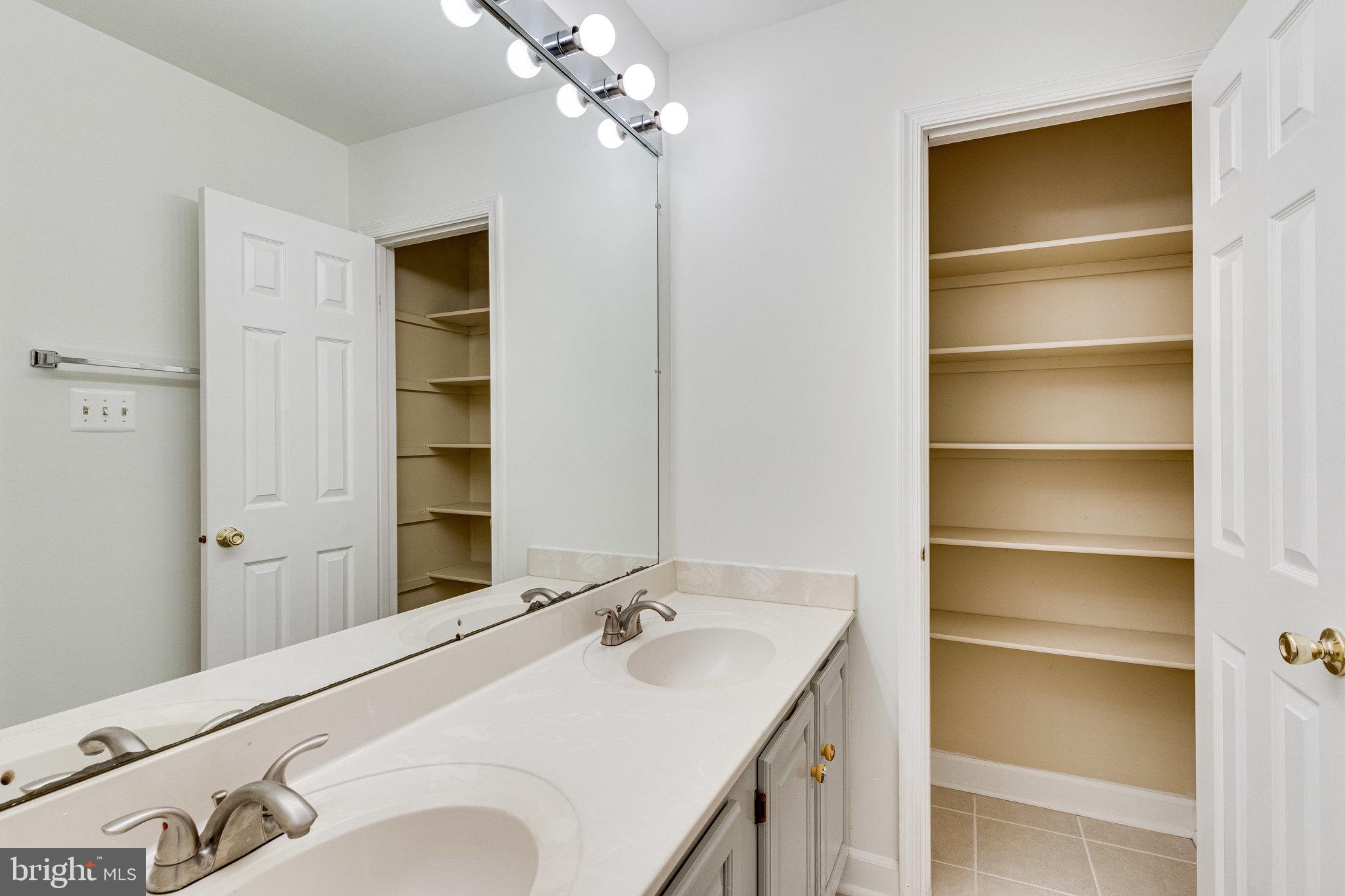 2403 Pondside Terrace Silver Spring, MD 20906 - Photo 31 of 45 Hall bath, with double sinks and linen closet
