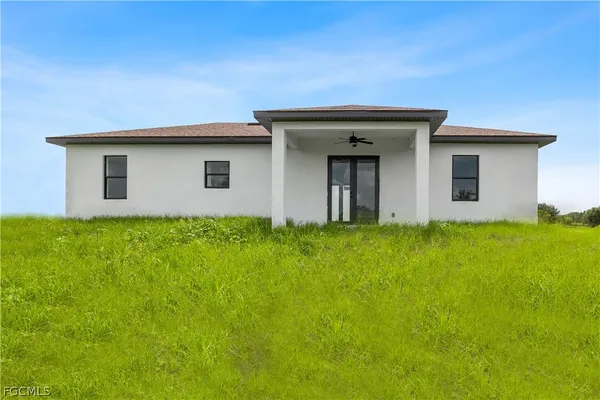 a house view with a garden space