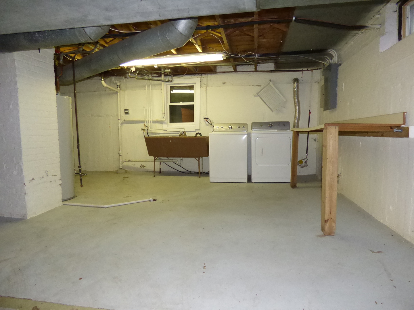 5416 Conrad Street Skokie, IL 60077 - Photo 11 of 14 a view of a room with racks on the wall