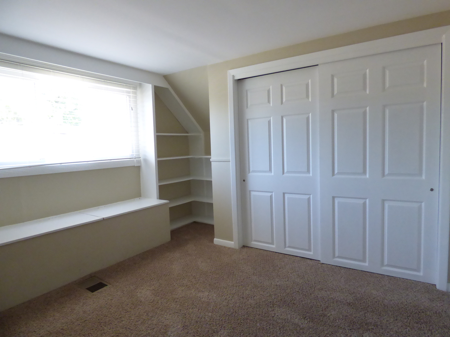 5416 Conrad Street Skokie, IL 60077 - Photo 8 of 14 a view of an empty room and window