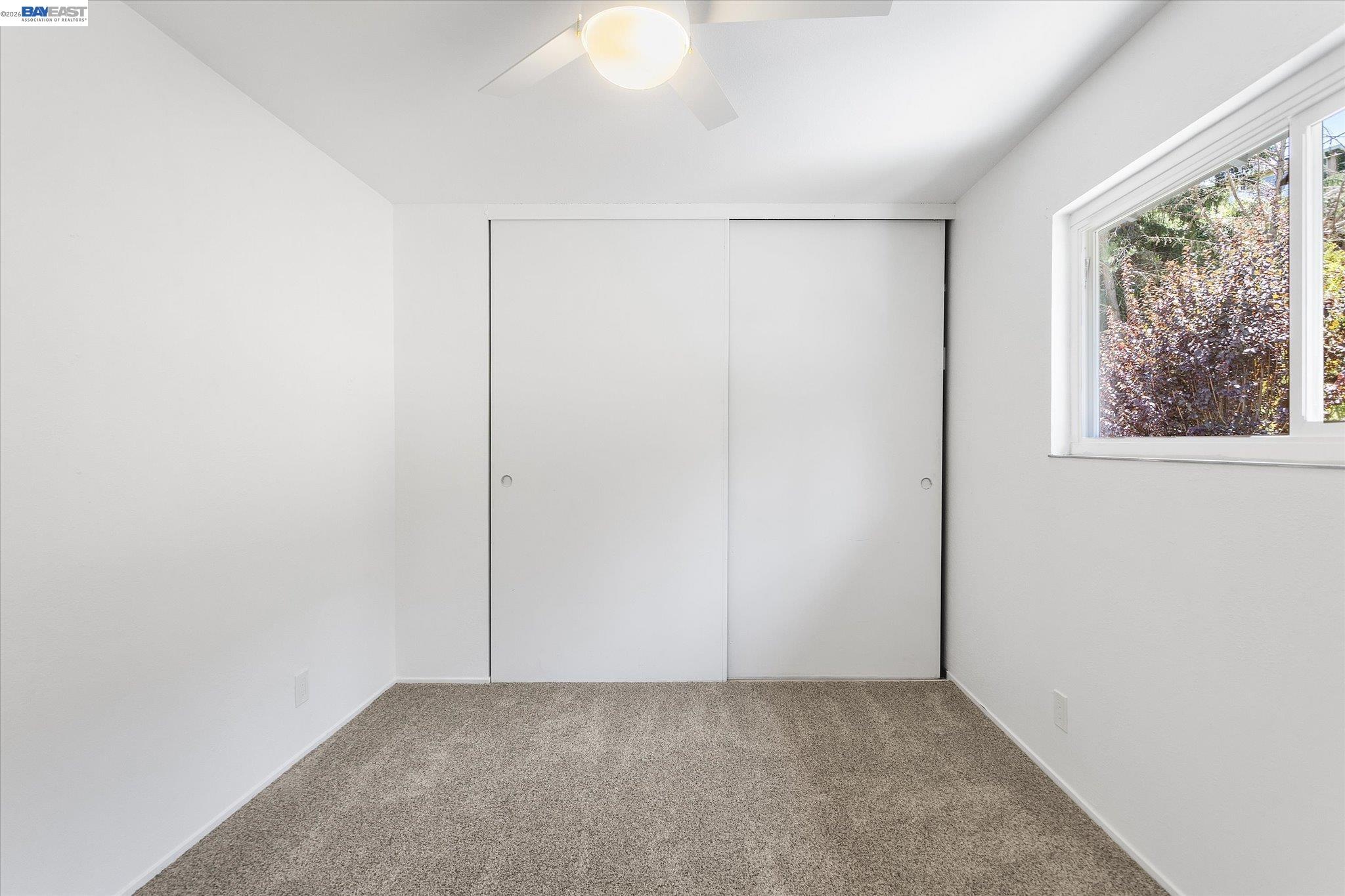 16683 Kildare Road Castro Valley, CA 94546 - Photo 43 of 77 a view of an empty room with a window