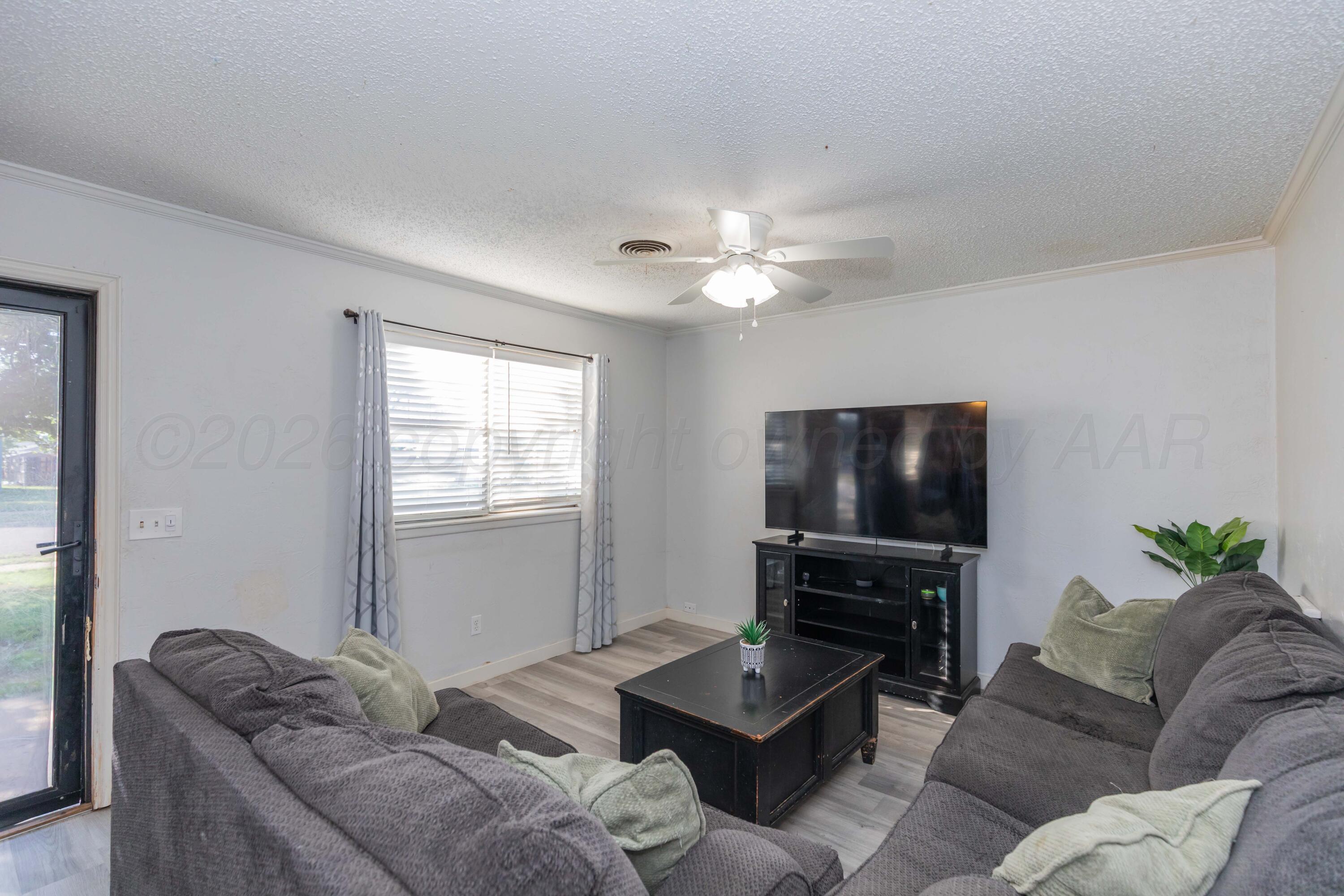 5120 Temple Drive Amarillo, TX 79110 - Photo 2 of 15 LIVING ROOM VIEW 1