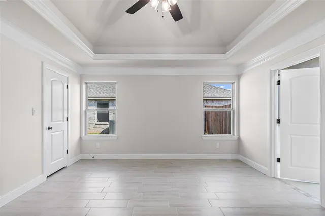 a bathroom with a granite countertop double vanity sink and mirror
