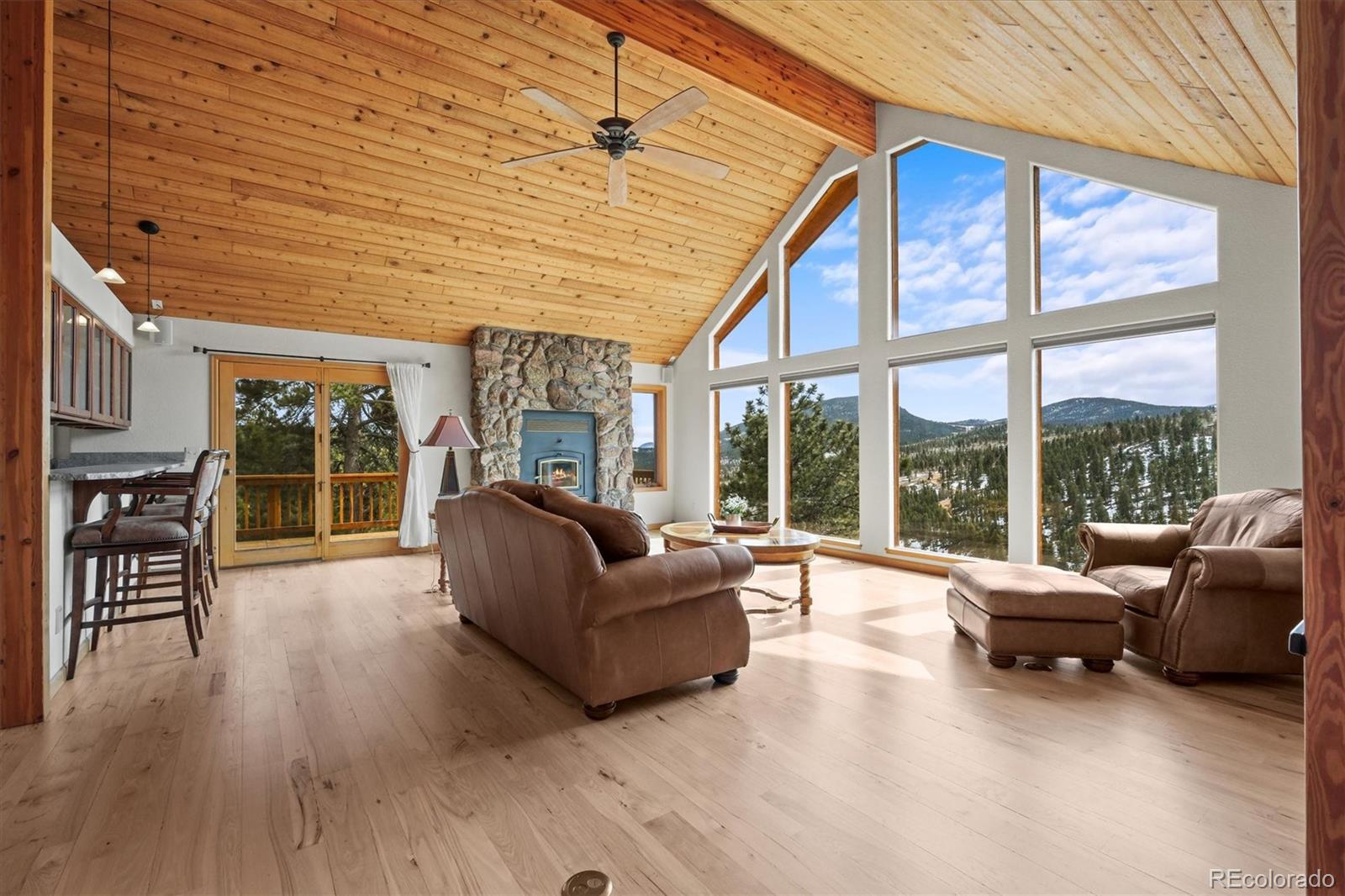 349 Royal Ridge Drive Bailey, CO 80421 - Photo 3 of 45 a living room with furniture and a large window