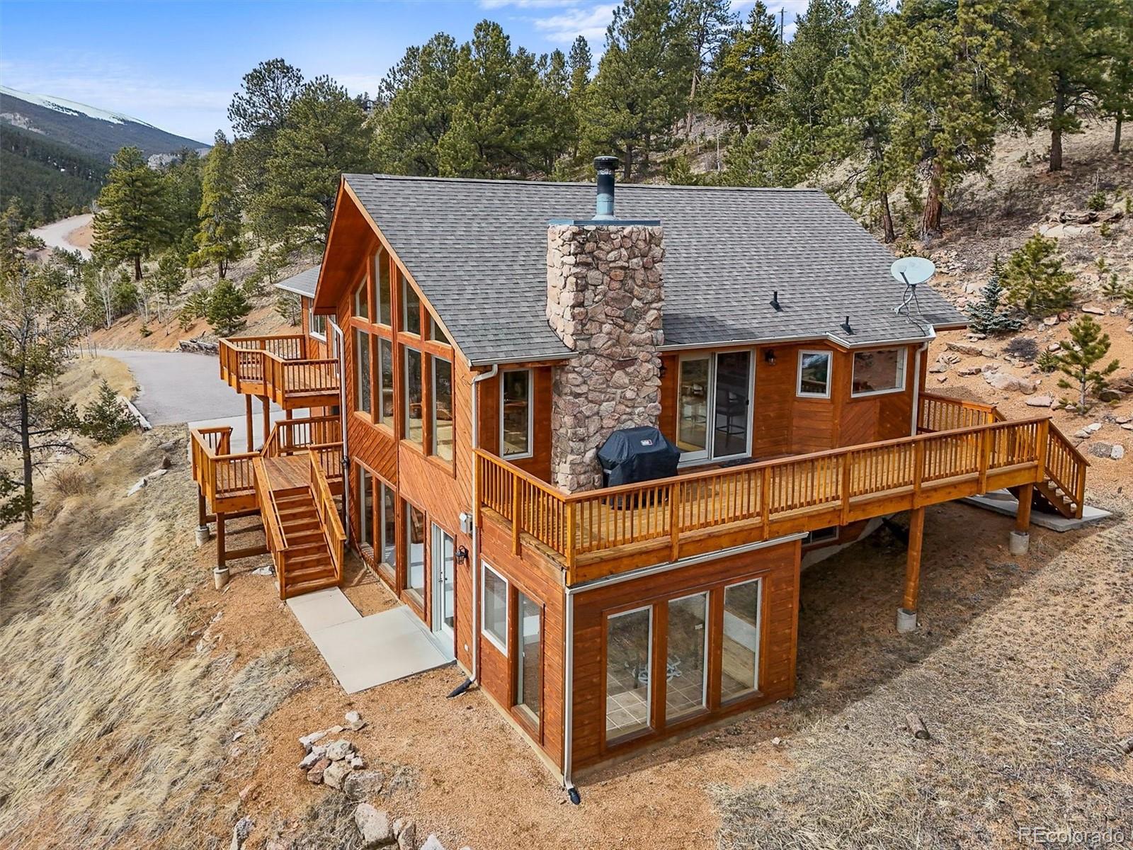 349 Royal Ridge Drive Bailey, CO 80421 - Photo 39 of 45 an aerial view of a house with a yard