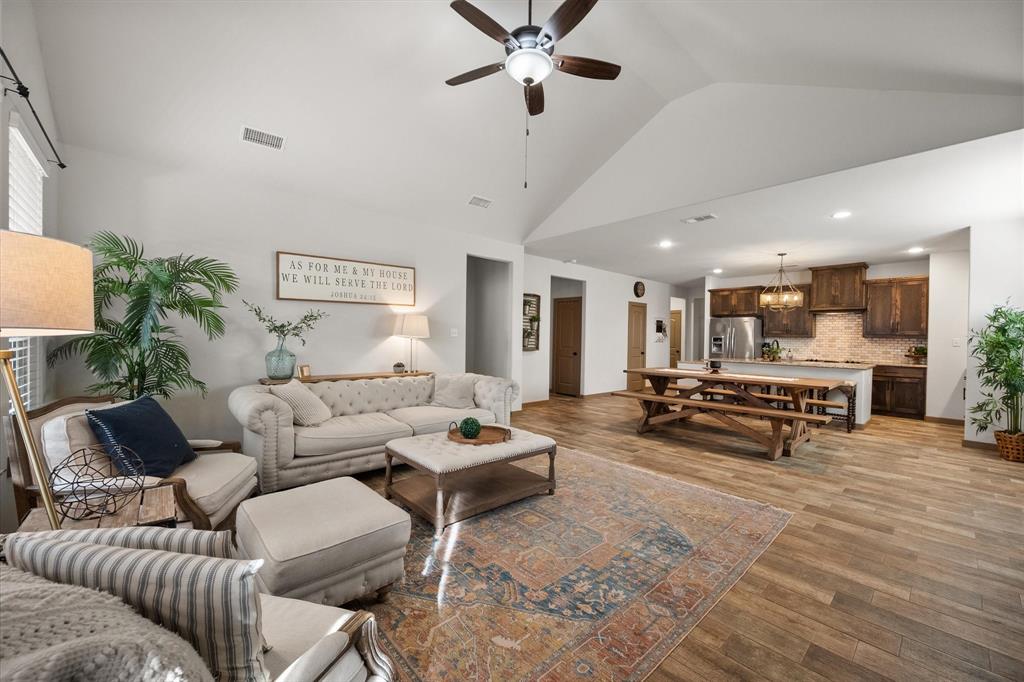 707 Phillips Court Mansfield, TX 76063 - Photo 11 of 28 a living room with furniture and a table