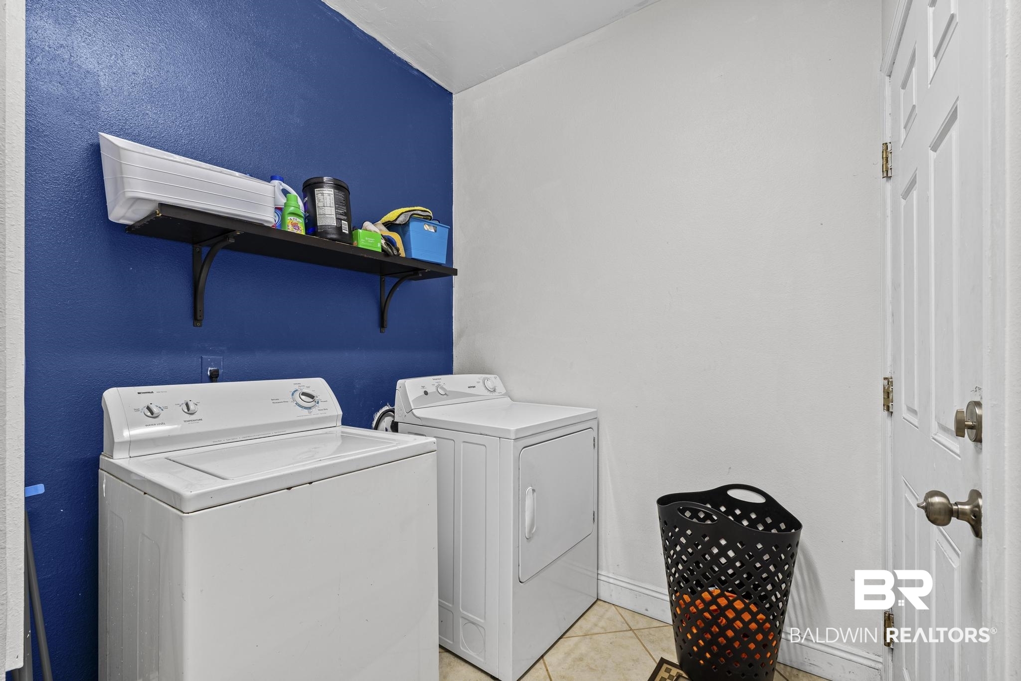 32875 Faircloth Road Lillian, AL 36549 - Photo 33 of 85 Laundry area featuring washer and clothes dryer and light tile patterned floors