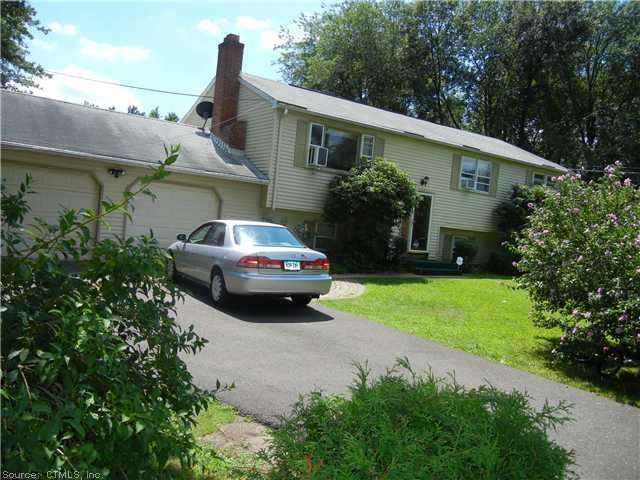 a car parked in front of a house