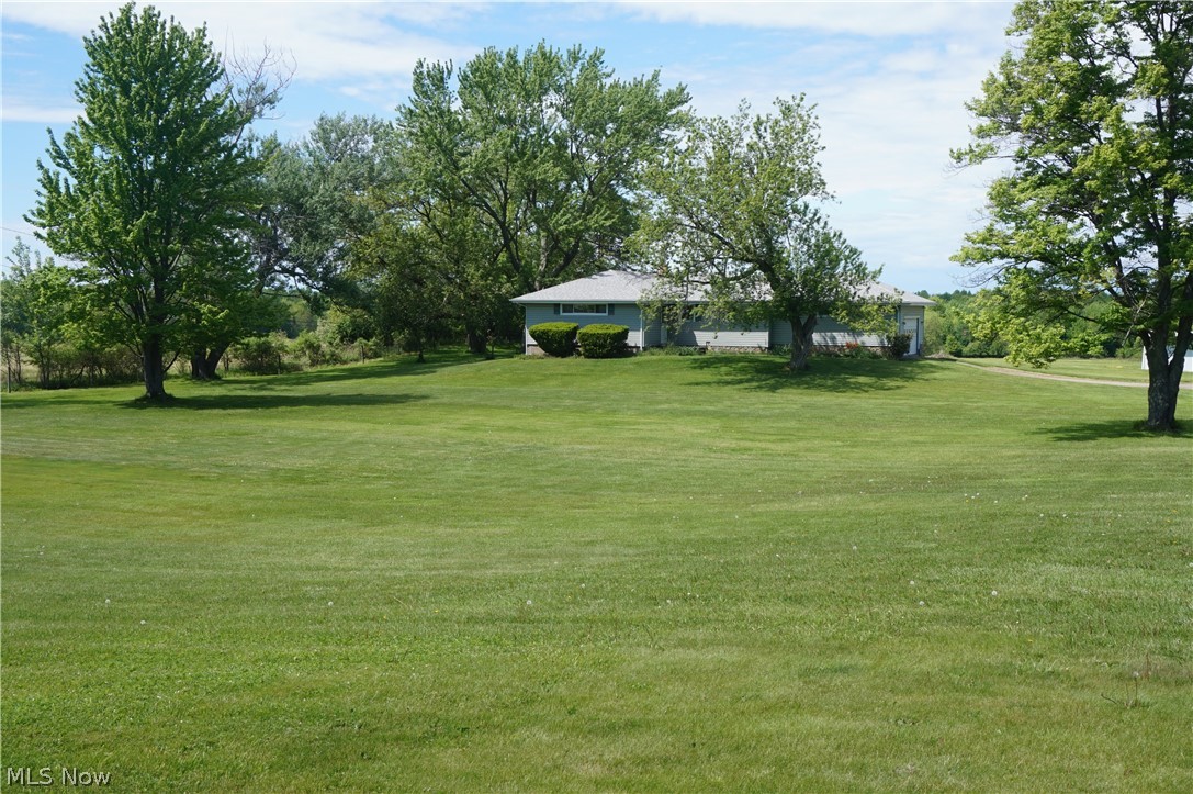 2465 South Ridge Road East Ashtabula, OH 44004 - Photo 1 of 38 Large Front Lawn: house is centered in the 3 acre parcel, with deep setback from road.