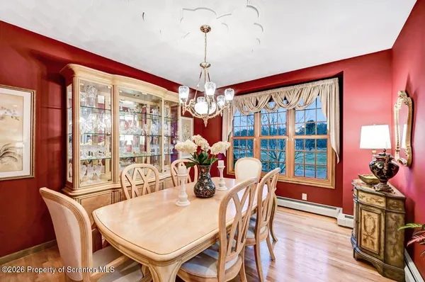 a bath tub sitting next to a window