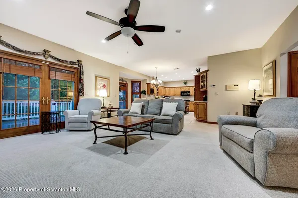 a bathroom with a toilet sink and shower