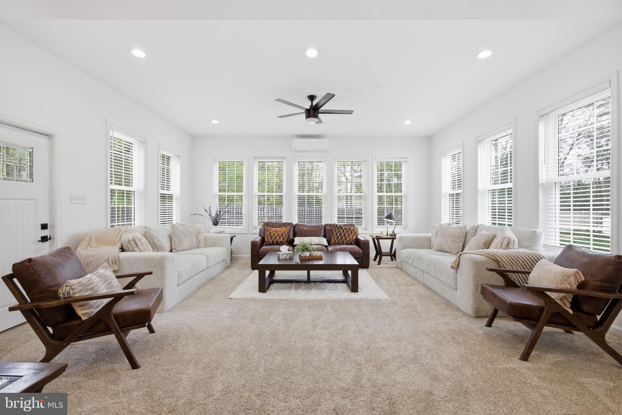 8664 Pohick Forest Court Springfield, VA 22153 - Photo 17 of 41 a living room with furniture and a large window