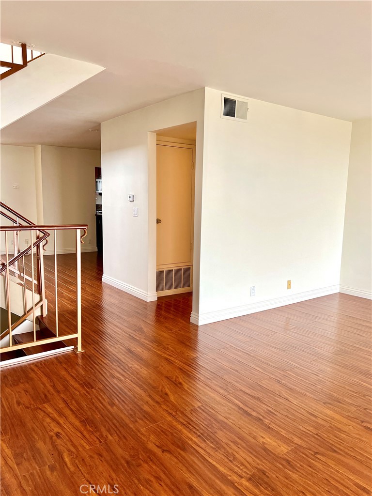 28129 Ridgethorne Court, Unit 34 Rancho Palos Verdes, CA 90275 - Photo 3 of 27 a view of a room with wooden floor