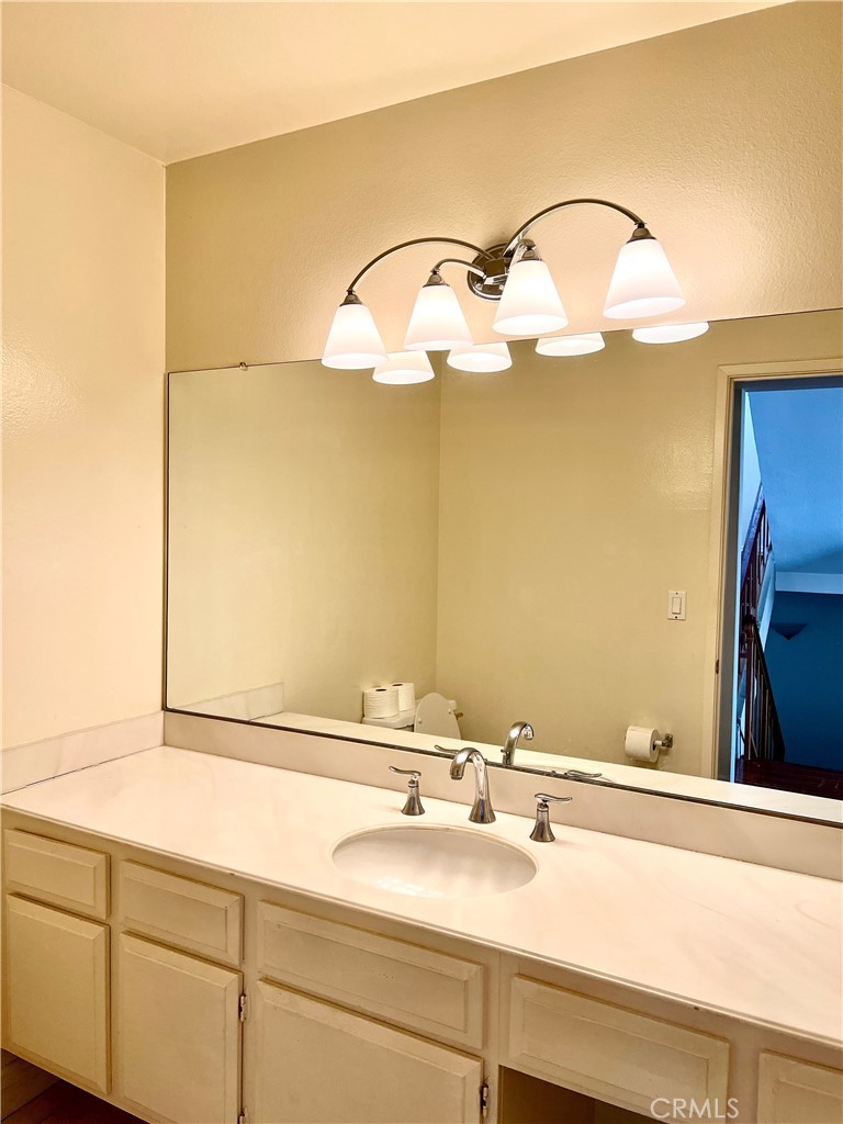 28129 Ridgethorne Court, Unit 34 Rancho Palos Verdes, CA 90275 - Photo 6 of 27 a bathroom with a sink and a mirror