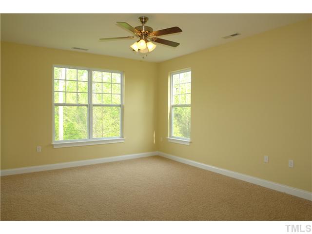3811 Lunceston Way, Unit 203 Raleigh, NC 27613 - Photo 14 of 20 a view of an empty room with a window