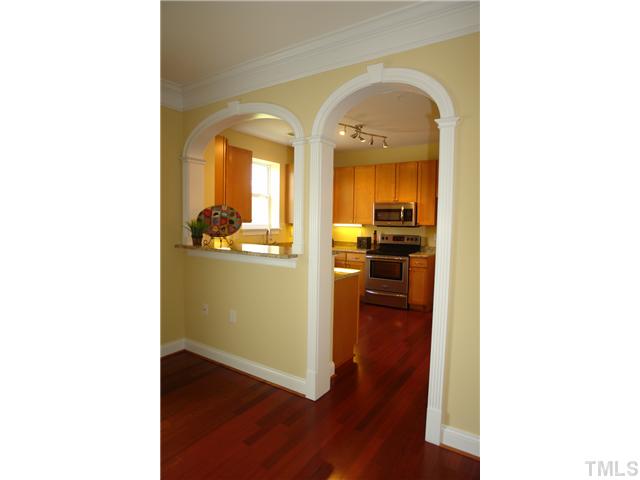 3811 Lunceston Way, Unit 203 Raleigh, NC 27613 - Photo 8 of 20 a view of a living room with bathroom and a hardwood floor