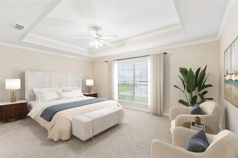 a bedroom with bed and a large window