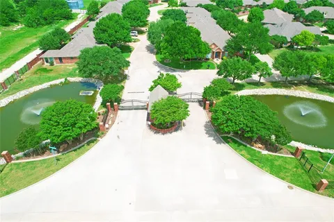 a view of a garden with a lot of flower plants